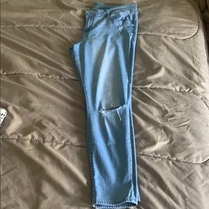 Light blue ripped jeans